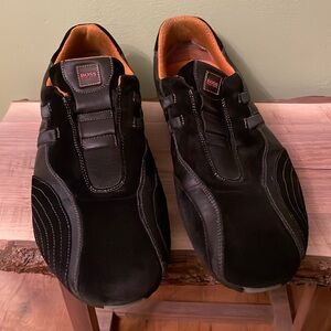 Hugo Boss black suede slip on loafers.